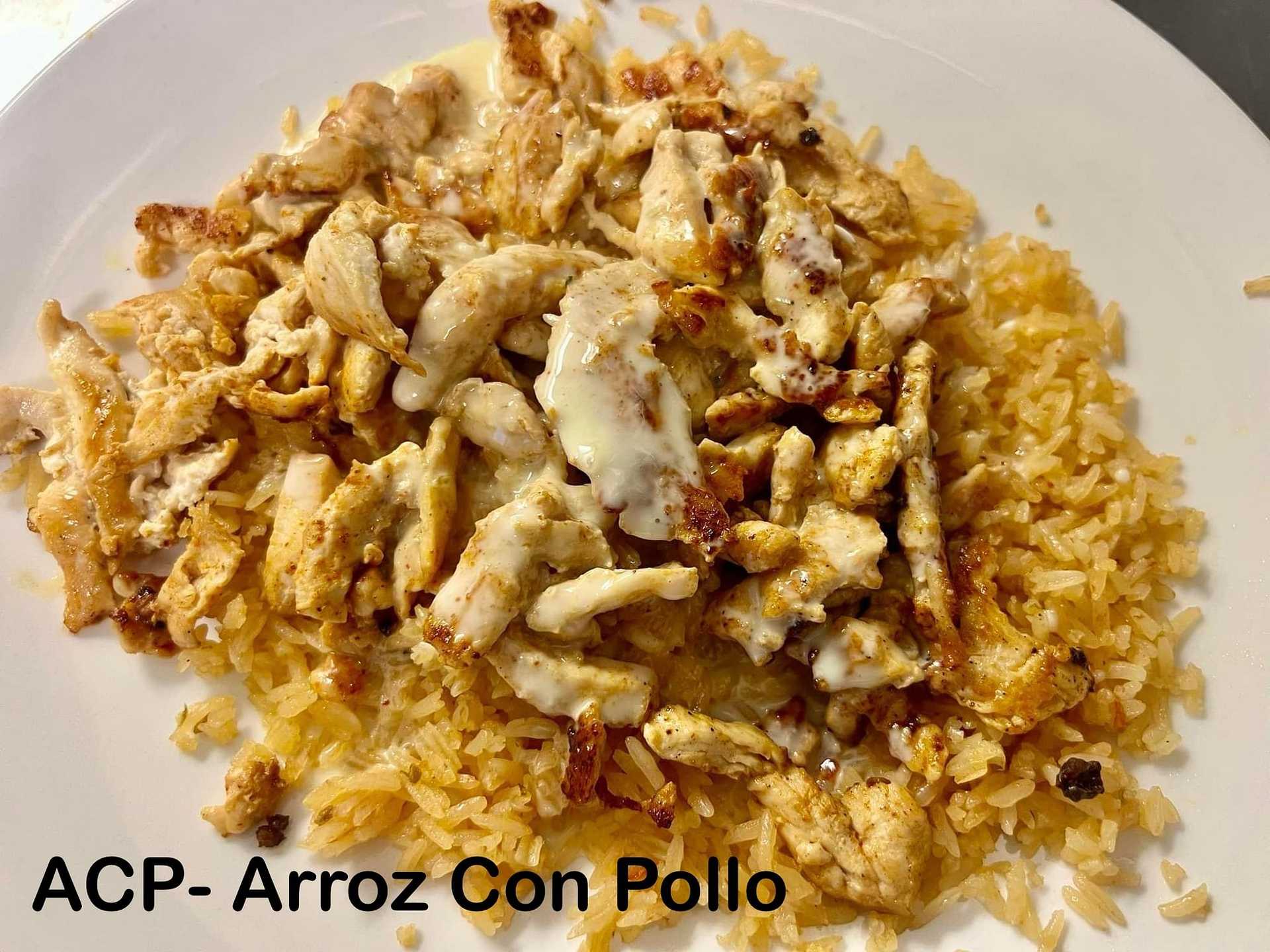 Plate of Arroz Con Pollo with grilled chicken and rice, text "ACP- Arroz Con Pollo" at bottom left.